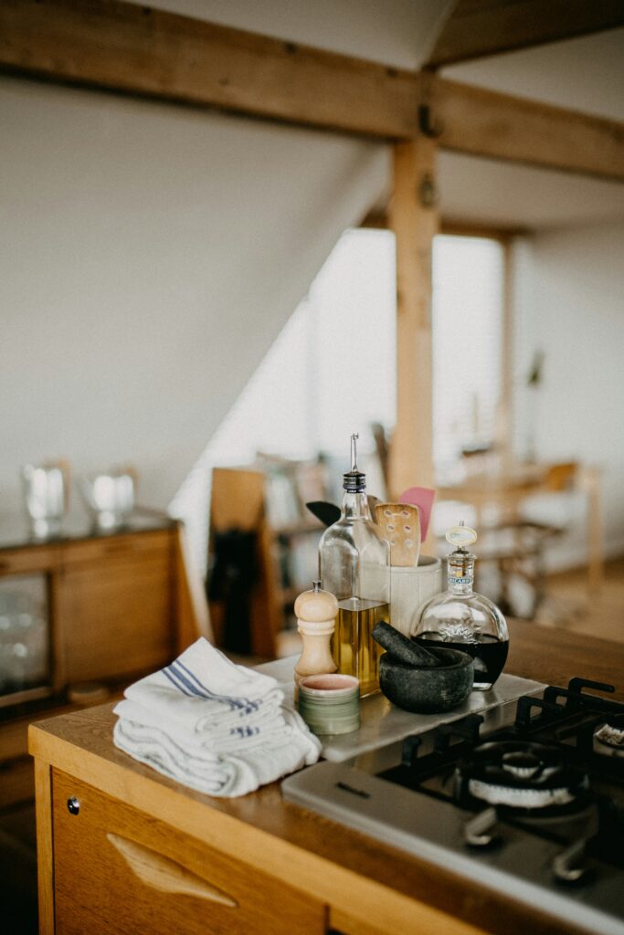Modern clean kitchen interior with white cabinets and organized countertops
