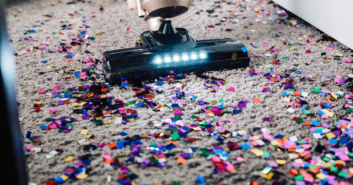 Professional janitor mopping a commercial floor