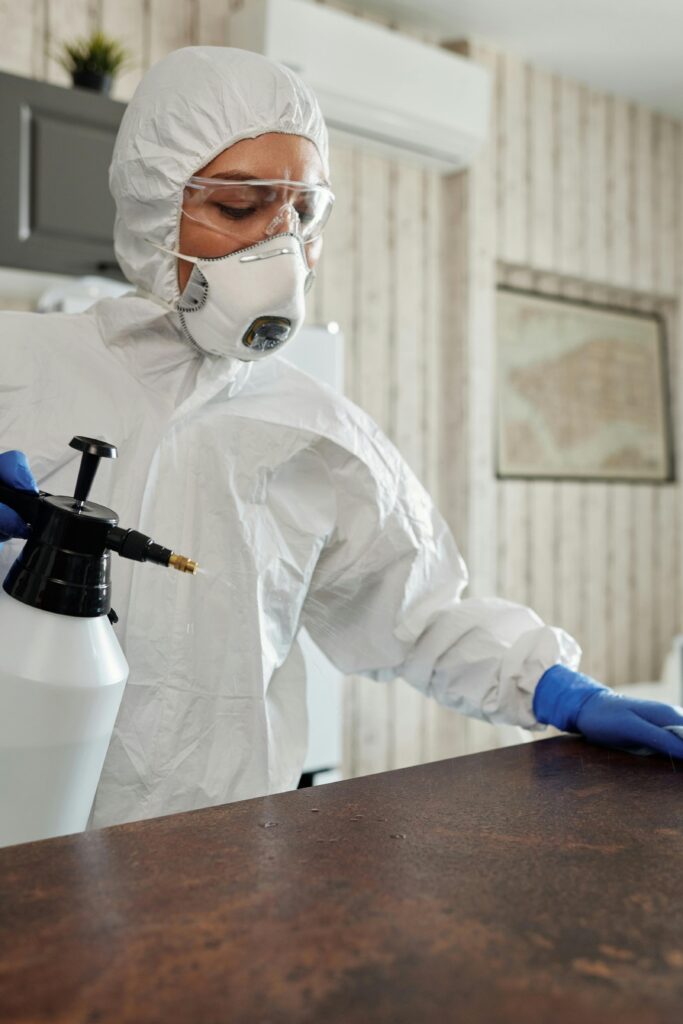 Cleaning Services in Tobyhanna, PA Professional cleaner sanitizing and disinfecting room surfaces
